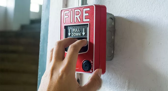 Setting off fire alarm