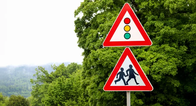 School sign with traffic light sign