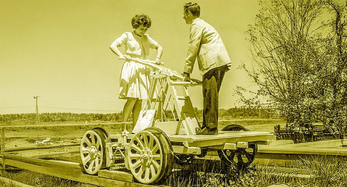 Railroad hand cart with two people