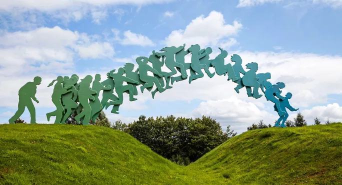 Sculpture of someone jumping a gap