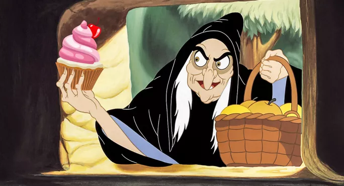 Wicked queen as witch with cake