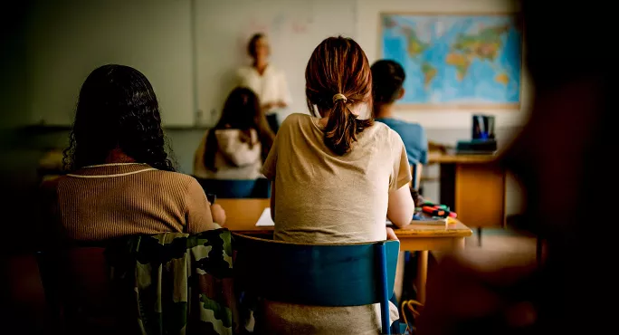 Secondary school teacher in classroom