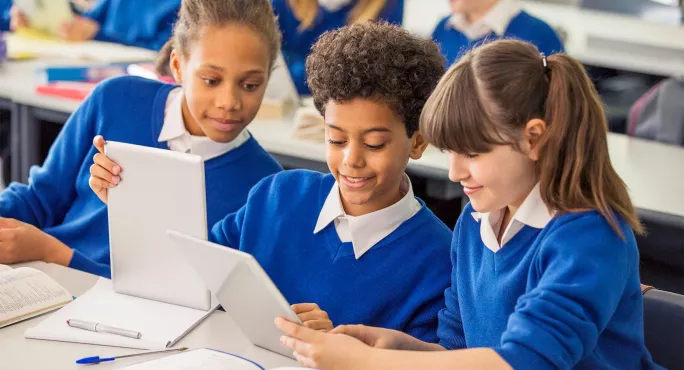 Students in class with ipads