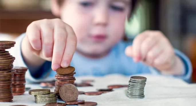 Small child counting money