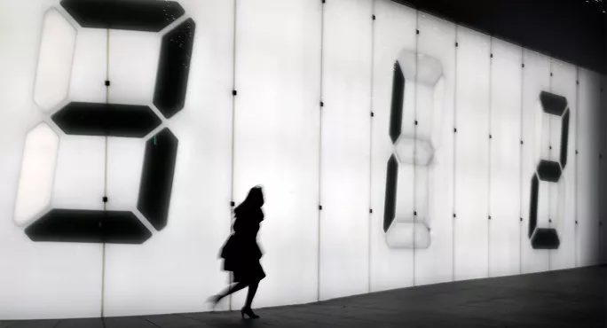 Digital numbers on a wall
