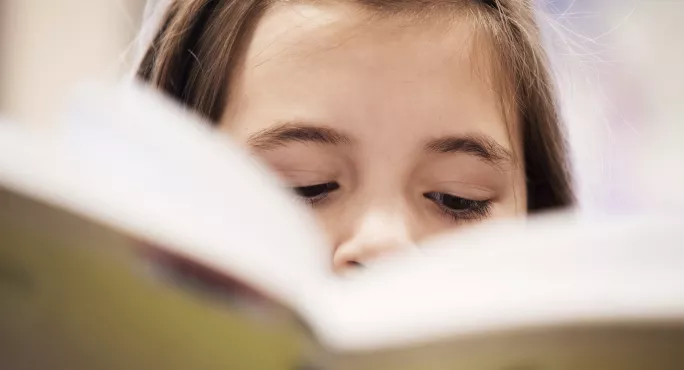 A girl reading a book