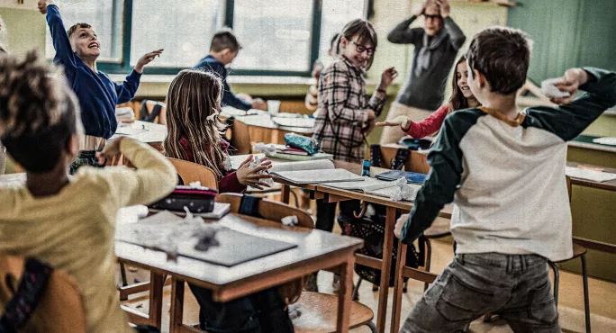 Children misbehaving in classroom