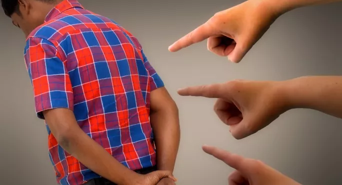 Several Fingers, Pointing In Blame At One Hand, Which Is Held Up To Signify 'stop'