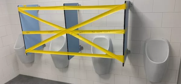 Socially Distanced Urinals In A Secondary School In The Netherlands