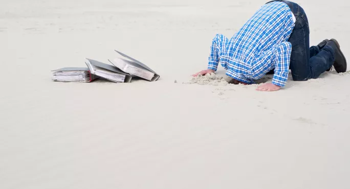 Teacher Buries Head In Sand Over Holiday Guilt