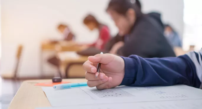 Pupils Sitting Exam At School