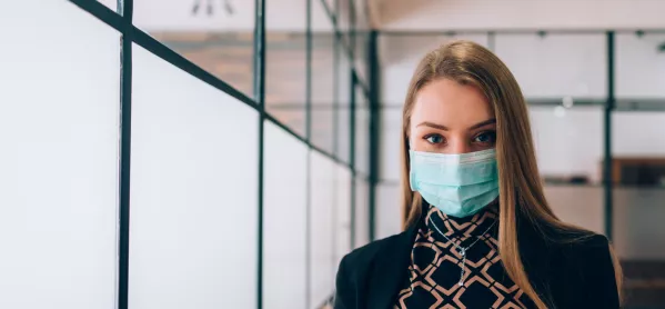 Coronavirus: Woman Wearing Mask