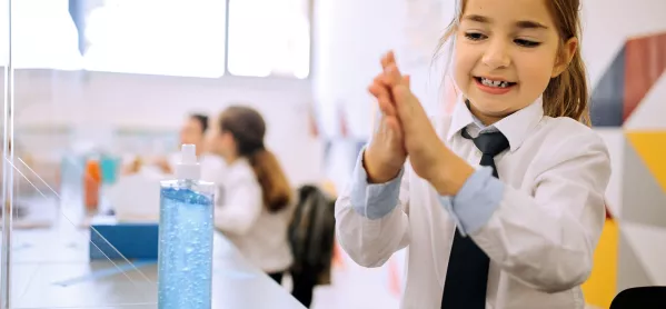 Schoolgirl Uses Hand Sanitiser Before Lunch