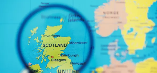 Map With Scotland Viewed Through Magnifying Glass