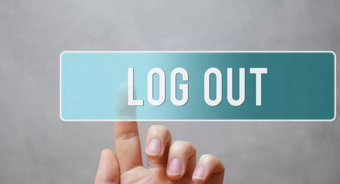 Woman Presses Sign Reading 'log Out'