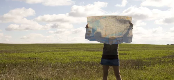Person In Countryside, Hidden Behind Large Map