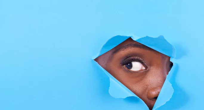 Woman Looks Out, Through Tear In Blue Background