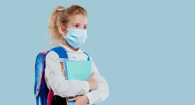 Schoolgirl, Carrying Bag & Books, & Wearing Face Mask