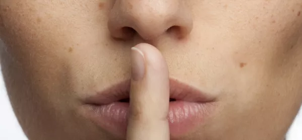 Woman With Finger On Her Lips, Indicating Quiet