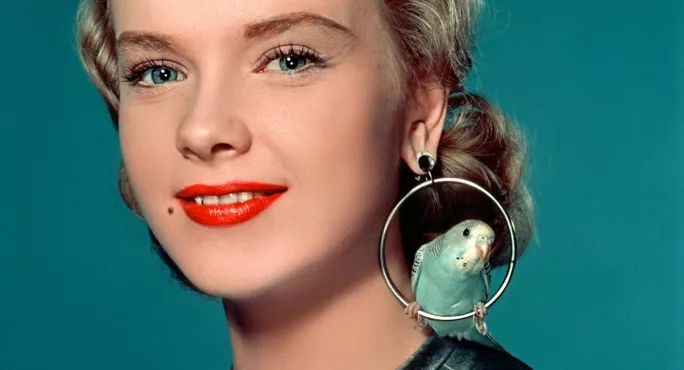 Classic 1950s Image Of A Woman Wearing Large Earrings