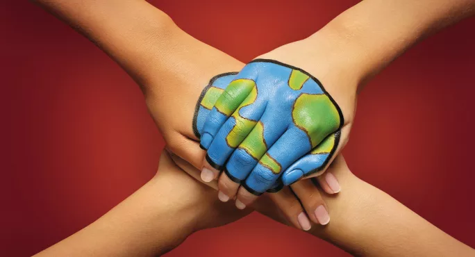Students Hands Joined Together Painted With A World. Climate Change Resources For Secondary Students