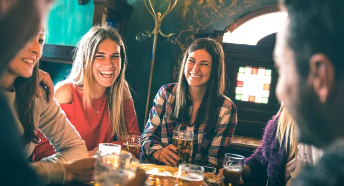 Group Of People, Sitting In A Pub