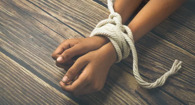 Hands & Arms, With Wrists Bound With Rope, Resting On A Table