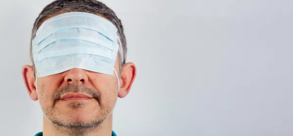 Covid Unlocking: Man With Face Mask Over His Eyes
