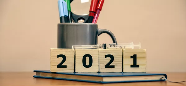 Pens, Books & A Syringe, Next To Wooden Blocks Reading "2021"