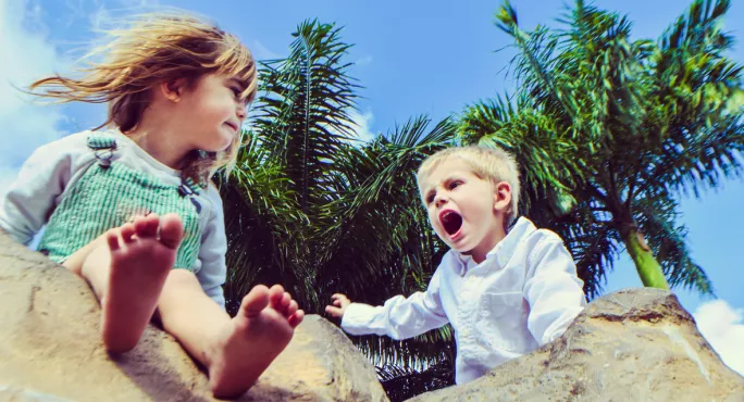 Toddler Boy Shouts At Toddler Girl In Sandpit