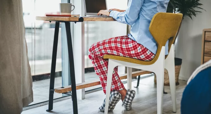 Woman, Working From Home Wearing Pyjamas & Slippers