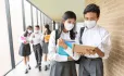 Local public health directors in some areas have called for masks to remain in communal areas of schools.