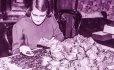A woman counting coins