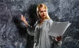 Maths teacher reading from script