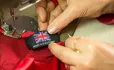 Sewing a Made in Great Britain clothing tag