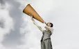 Woman with loud speaker