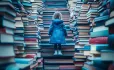 Girl surrounded by books