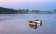 Two small boats on calm water