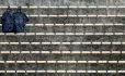 Two lone people in the stands
