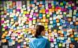 Teacher with lots of post-it notes