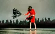 Lady with broken umbrella