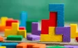 Stacking coloured blocks