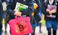 School girl with bitcoin printed bag
