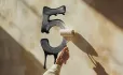 Number 5 being painted