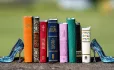 Religious books with glass slipper book ends
