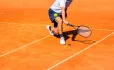 Tennis player returning serve