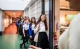 Pupils queuing outside classroom