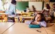 Pupil sitting on her own
