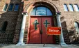 Church doors with detour sign