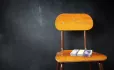Wad of money on chair
